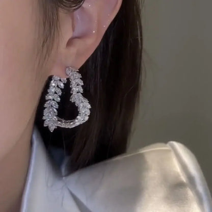 Celeste Coeur™ oorbellen — Luxe Hartvormige Zirconia Elegantie